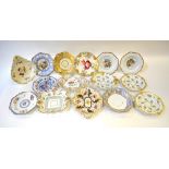 A collection of Victorian dessert wares having moulded handles and borders comprising: two