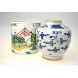 A Chinese porcelain famille vert brush pot decorated with a seated mandarin being offered gifts,