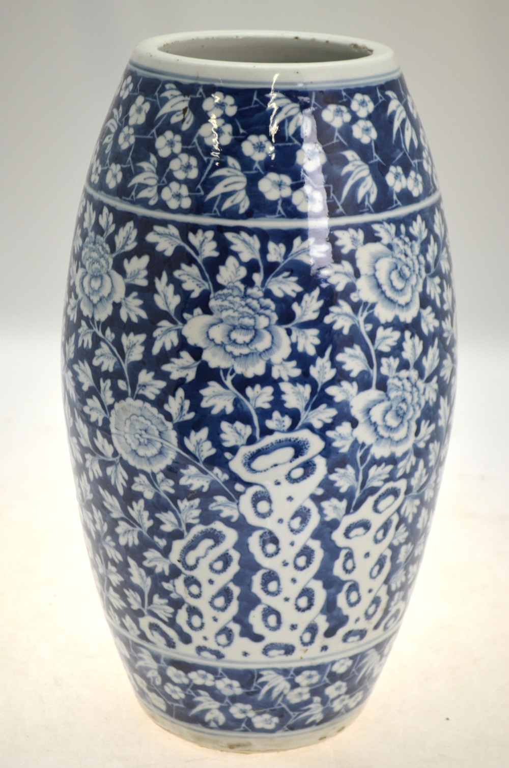 A Chinese blue and white slim barrel shaped vase decorated with peony, flowers, - Image 2 of 5