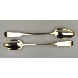 A pair of George III Scottish silver fiddle pattern hash (or stuffing) spoons,