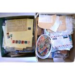 Two boxes of assorted loose World postage stamps - many sorted and bagged (2)