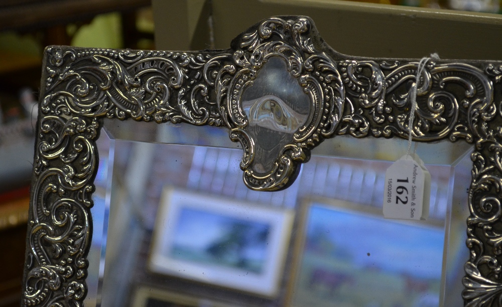 A large Victorian silver-faced easel toilet mirror with bevelled plate surmounted by rococo - Image 3 of 9