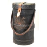 A 19th century tarred canvas Naval shot-bucket and cover with leather strap handle and vestigial