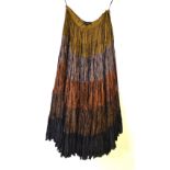 A Rohit Bal crinkled silk ethnic skirt in striped shades of brown,