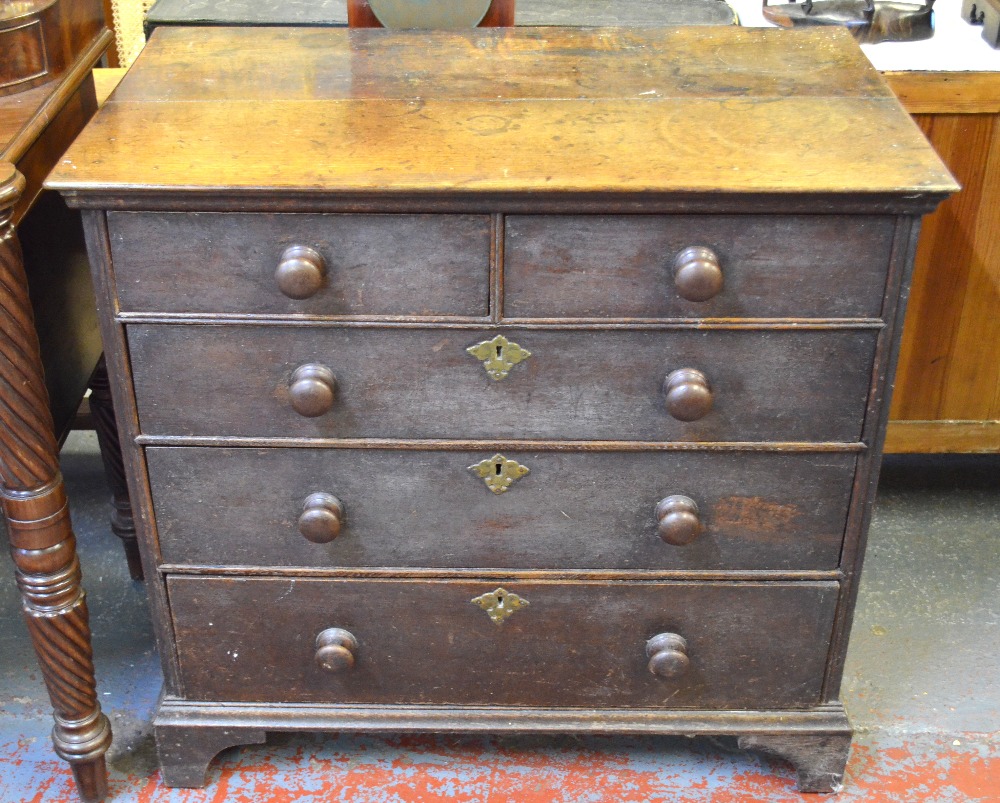 An 18th century oak chest of two short over three long graduated drawers raised on bracket feet, - Image 2 of 5