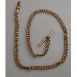 A 9ct curb style Albert chain fitted with swivel and bar,