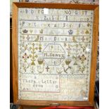 An Edwardian needlework sampler, worked with alphabets and numerals, various symbols,