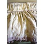 A pair of lined and inter-lined curtains, cream ground embroidered with pink/green flowers,