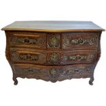 A good Louis XV provincial walnut serpentine top bombe commode,