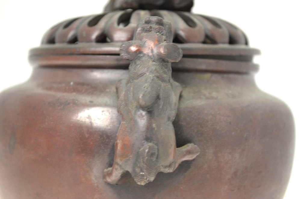 A Japanese bronze spherical censer on three feet with two handles formed as Shi Shi, - Image 4 of 5