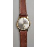 A gentleman's Tudor Royal dress watch with baton dial on brown leather Rolex strap with gilt metal