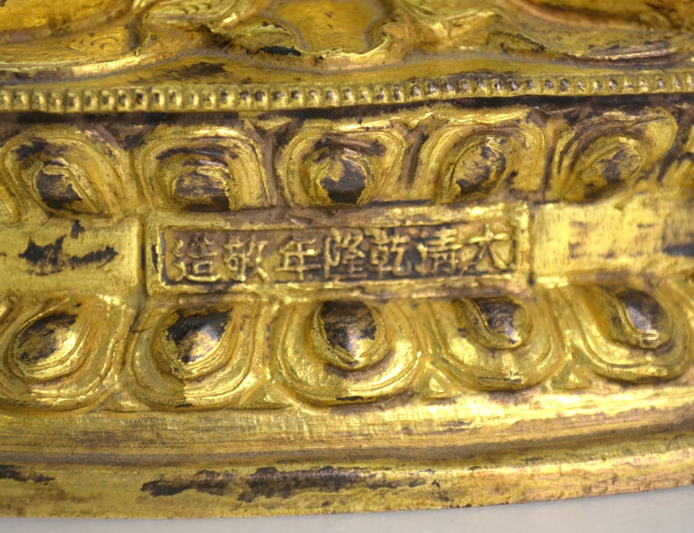 A Chinese gilt bronze 18th century seated figure of Buddha, - Image 6 of 8