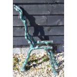 A pair of heavy cast iron bench ends