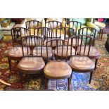 A set of ten 19th century mahogany framed side chairs having moulded vertical splats and brass
