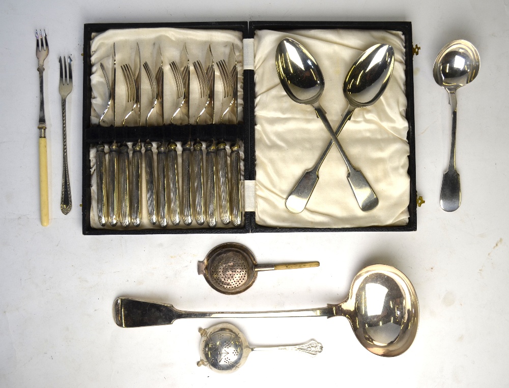 A Scottish silver tea strainer, Hamilton & Inches, Edinburgh 1925,