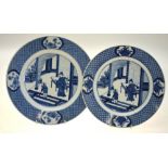 Two Chinese blue and white plates decorated with figures in an interior, 18th century,