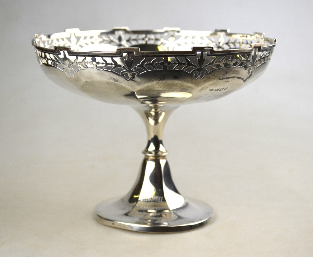 A silver comport with foliate-pierced rim, on stemmed foot, Goldsmiths & Silversmiths Co. Ltd.