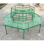 A green painted sectional steel tree bench, 2 m diameter (aperture 1.