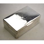 An Edwardian silver cigarette box, London 1906, to/w a set of six Dutch coffee spoons,