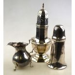 A late George II silver baluster cream jug with cut rim,