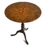 An antique Maltese tripod table, the circular top inlaid with specimen timbers,