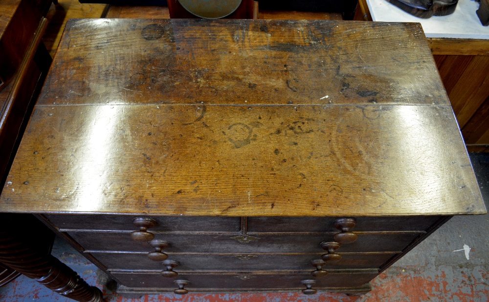 An 18th century oak chest of two short over three long graduated drawers raised on bracket feet, - Image 3 of 5
