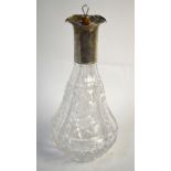 A cut glass four-division decanter,