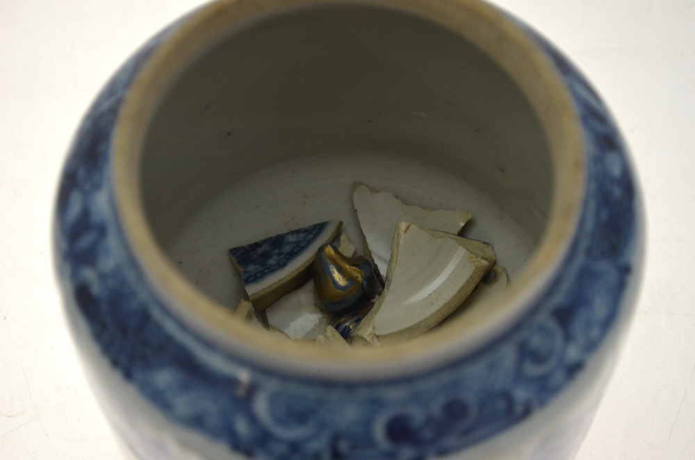 A Chinese blue and white saucer dish decorated to the centre with a dragon amongst waves, - Image 8 of 8