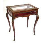 A 19th century ormolu mounted walnut vitrine table,