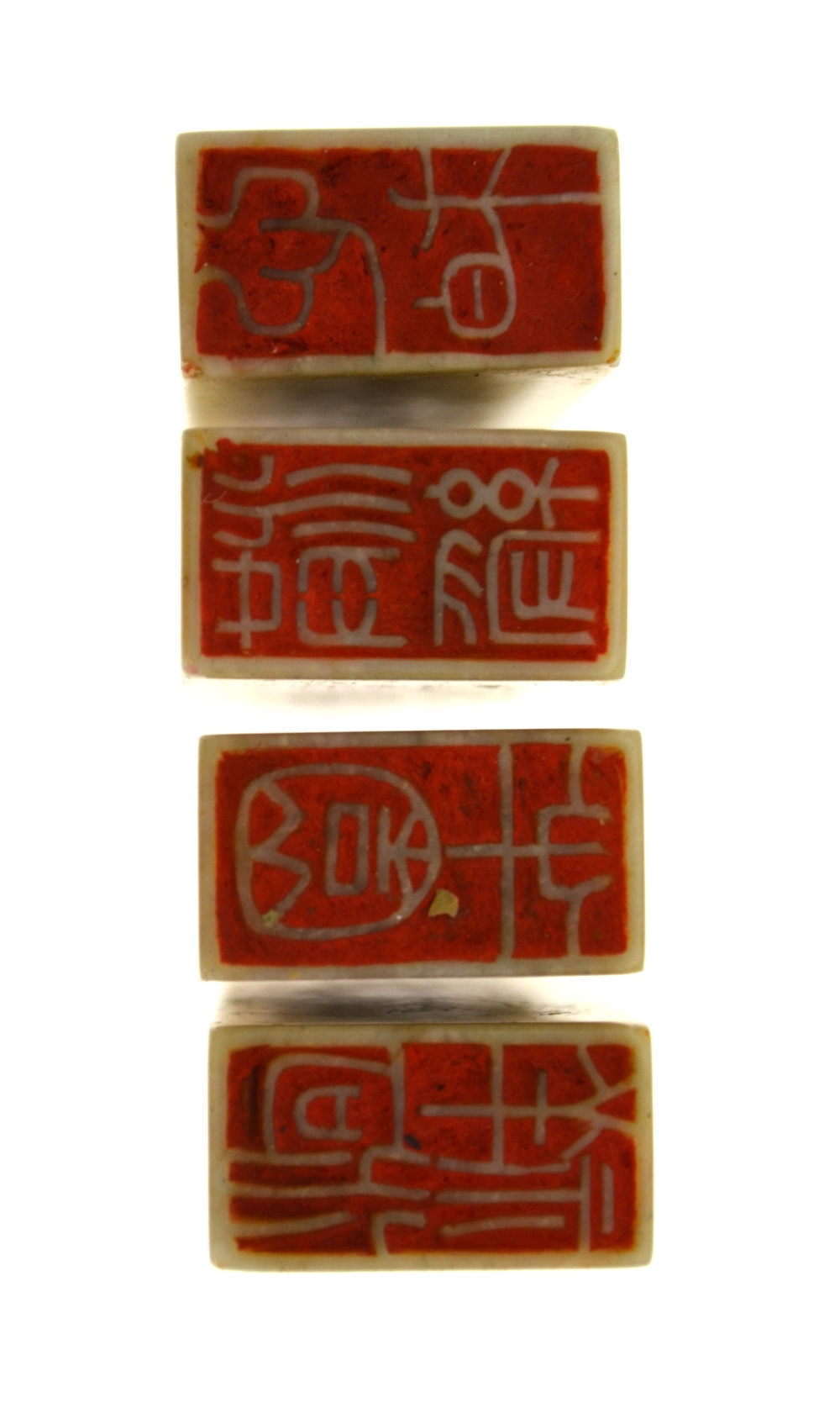 Four Chinese rectangular hardstone seals incised with calligraphy above flowers and foliage, - Image 4 of 4