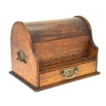 A late 19th century oak tambour domed top stationery box with drawer to base