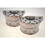 A pair of early 19th century continental tin glazed bough pots decorated with floral sprigs, 7.