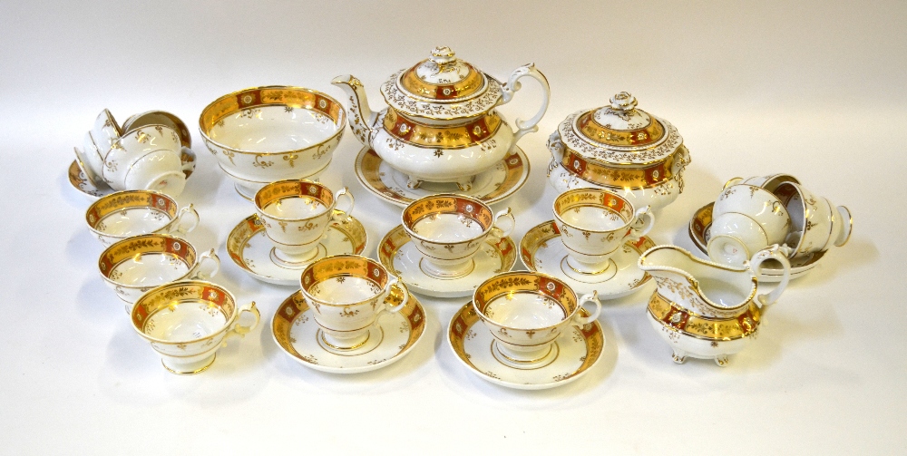 A Ridgway early Victorian tea/coffee service, decorated with a gilded burnt orange and peach border,