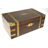 A Victorian brass bound rosewood writing box, the top hinged to reveal a tooled green leather slope,