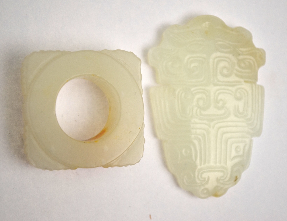 A Chinese jade pendant carved with TaoTie masks, 5.5 cm long x 3. - Image 2 of 4