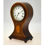 A French inlaid mahogany balloon timepiece with drum movement and oval fan marquetry medallion,