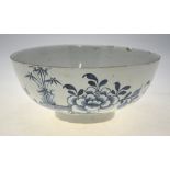 An 18th century Delft, probably English, blue and white bowl painted with a fence,