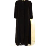 A quilted dark brown velvet coat, size 10,