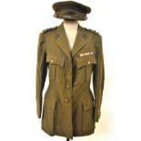A WWII period 9th Lancers officers khaki uniform and cap to/w a greatcoat and an army issue khaki