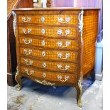 A late 19th/20th century ormolu mounted kingwood and satinwood serpentine chest of six long even