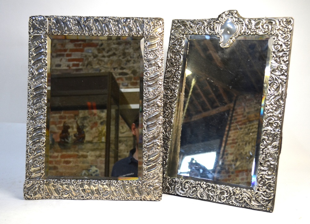 A large Victorian silver-faced easel toilet mirror with bevelled plate surmounted by rococo