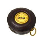 A Victorian gilt metal pocket barometer by T Wheeler, London, with silvered dial,