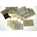 A small collection of Russian banknotes: three 1912 500 roubles, three 1917 1,000 roubles,