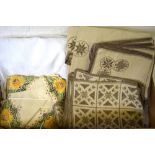 A box of Cypriot table linen to include several embroidered linen tablecloth and napkin sets,