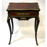 A 19th century French ebonised ormolu mounted boullework dressing/work table,
