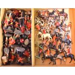 A quantity of Britain's die cast huntsmen and hounds and guardsmen to/w a collection of Elastolin