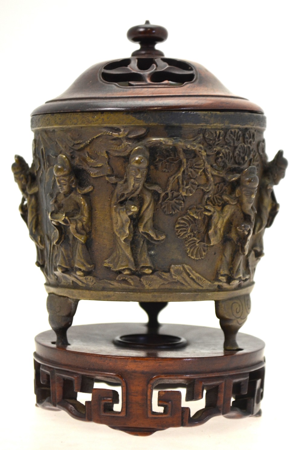 A Chinese bronze cylindrical censer cast with eight Daoist immortals and Shou Lau standing on