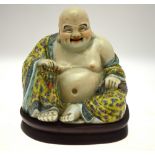 A Chinese porcelain famille rose figure of Buddai Ho Sang, impressed seal mark to base, approx.