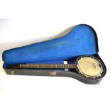 A cased banjo by John Alvey Turner of London
