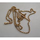 A rose-coloured metal fancy linked double Albert chain with swivel and bar, approx 19g,